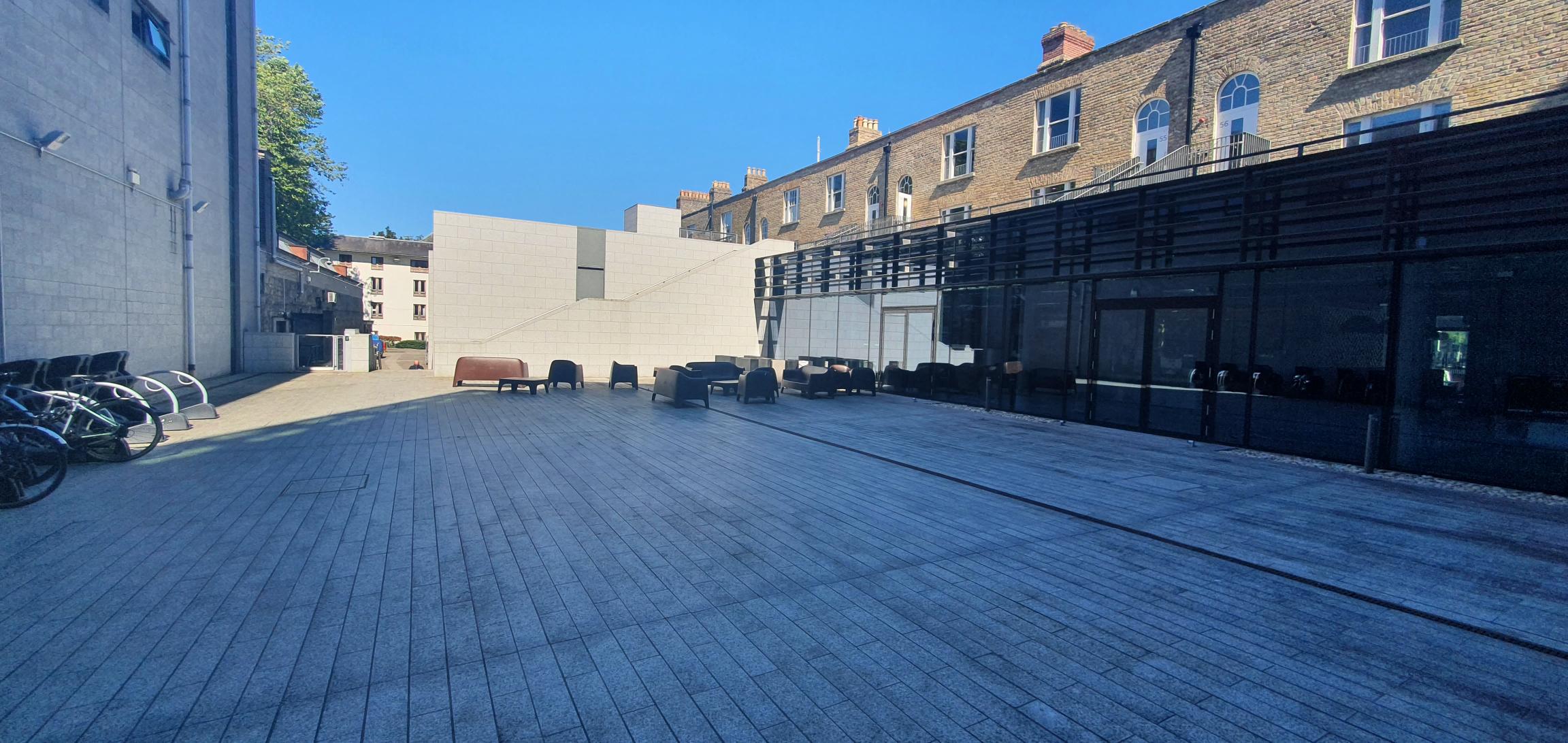 Photo showing the fellows' square of Trinity College Dublin. No building in particular is focused on